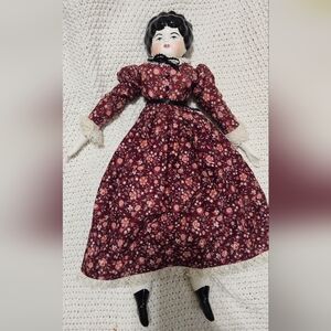 Vintage Porcelain Doll in Floral Burgundy Dress